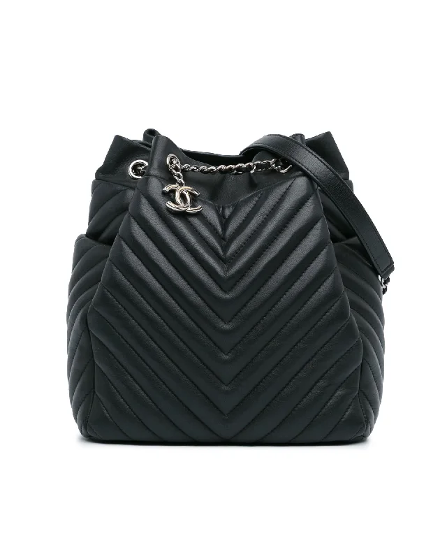 Quilted Leather Bucket Bag with Drawstring Closure and Exterior Pockets